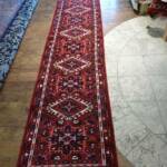 Esfahani Persian Rug Gallery
 Origin: IRAN/ STYLE: GHARAJEH / DESIGN: RUNNER
 Pile: WOOL / FOUNDATION: COTTON
 Length FT: 9.61/ WIDTH FT: 2.40/ SQF: 23.02
 Length M: 2.93 / WIDTH M: 0.73/ SQM: 2.14
 Approx age: OVER 15 YEARS NEW / APPROX KPSI: 100
 Invent # 1142



